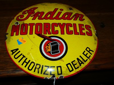 Lot 1120 - A convex enamelled sign for Indian Motorcycles,...
