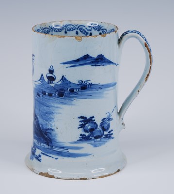 Lot 2079 - An English blue and white delftware tankard,...