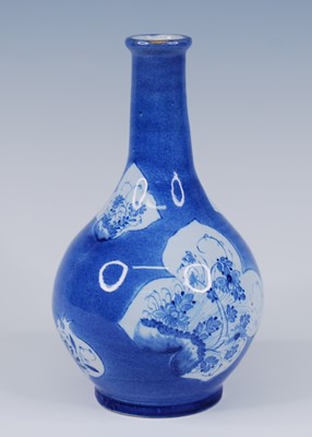Lot 2073 - An English blue and white delftware bottle...