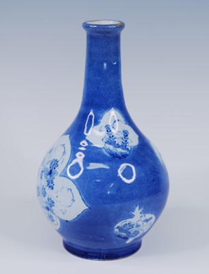 Lot 2073 - An English blue and white delftware bottle...