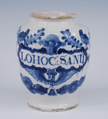 Lot 2076 - An English blue and white delftware dry drug...