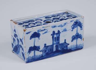 Lot 2088 - An English blue and white delftware flower...
