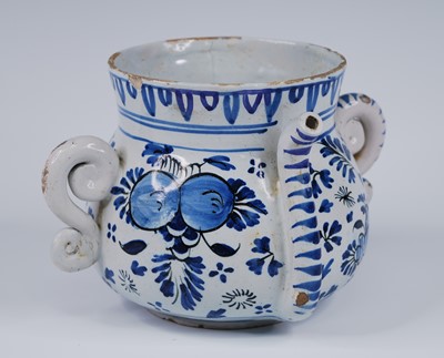 Lot 2077 - An English blue and white delftware posset pot,...