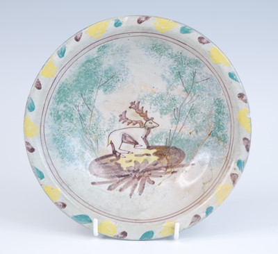 Lot 2134 - A Spanish Talavera polychrome tin glazed...