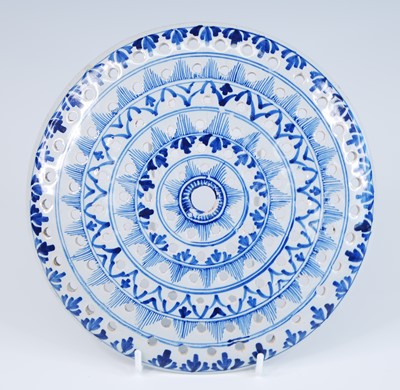 Lot 2059 - A Lambeth blue and white delftware colander,...