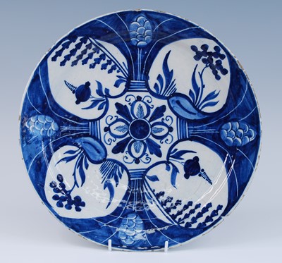 Lot 2146 - A Delft blue and white charger, 18th century,...
