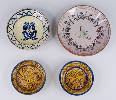 Lot 2138 - A pair of Spanish polychrome tin glazed...