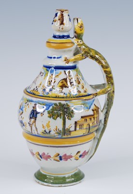 Lot 2139 - A Spanish grotesque polychrome glazed...