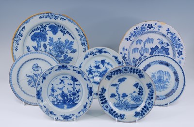 Lot 2105 - An English blue and white delftware charger,...