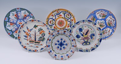 Lot 2143 - A collection of six Delft polychrome plates,...