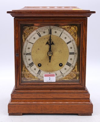 Lot 2 - An early 20th century oak cased bracket clock,...