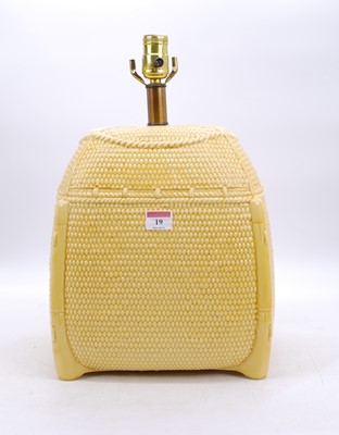 Lot 19 - A modern yellow glazed table lamp, in the form...