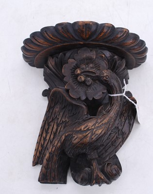 Lot 30 - A carved beech wall bracket, in the form of a...