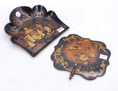 Lot 35 - A Victorian black lacquered papier-mache crumb...