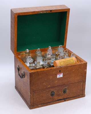 Lot 48 - A 19th century scrumble pine apothecary chest,...