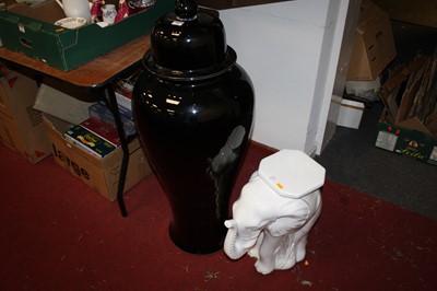 Lot 89 - An unusually large black glazed temple jar and...