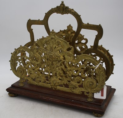 Lot 96 - An early 20th century pierced brass letter...