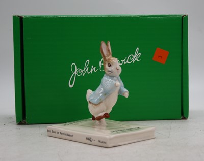 Lot 230 - A John Beswick Beatrix Potter figure 'Peter on...