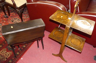 Lot 1263 - A 1930s oak two-tier cake stand, having...