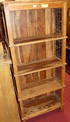 Lot 1277 - A contemporary Eastern teak and wrought metal...