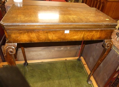 Lot 1300 - An early 20th century figured walnut fold-over...