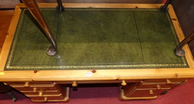 Lot 1302 - A modern pine round cornered twin pedestal...