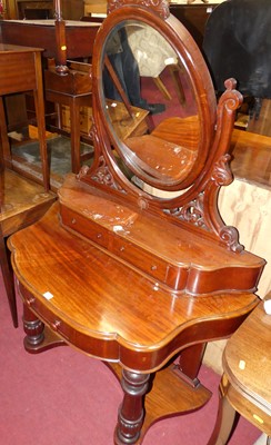 Lot 1311 - A mid-Victorian mahogany duchess dressing...
