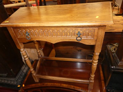 Lot 1318 - A contemporary moulded oak single drawer...