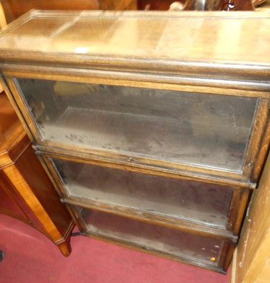 Lot 1323 - A 1920s Globe Wernicke oak three-tier stacking...