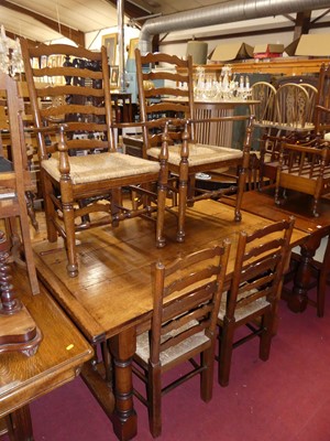 Lot 1357 - A contemporary joined oak dining suite in the...