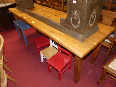 Lot 1368 - A contemporary stained pine plank top...