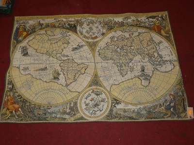 Lot 1377 - A machine made needlework wall hanging...