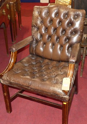 Lot 1395 - A contemporary mahogany framed tan leather...