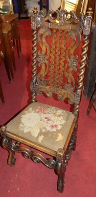 Lot 1401 - A 19th century walnut carved and wavy splat...