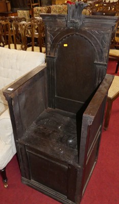 Lot 1407 - A made-up panelled oak ecclesiastical armchair