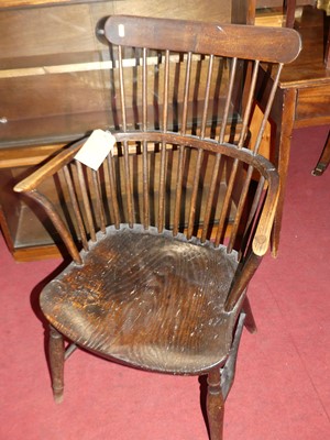Lot 1411 - A 19th century provincial elm and beech comb...