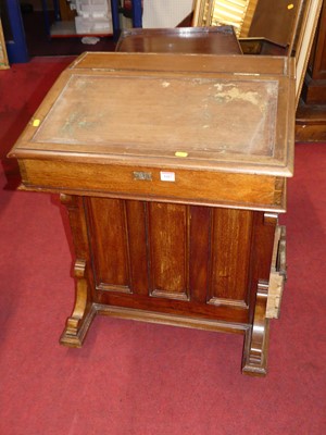 Lot 1417 - A Victorian mahogany slope front Davenport,...