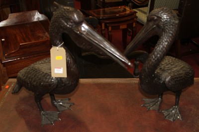 Lot 1424 - A pair of contemporary bronzed metal models of...