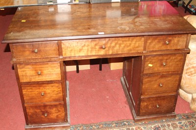 Lot 1426 - An early 20th century hardwood kneehole...