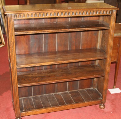 Lot 1432 - A contemporary joined oak bookshelf, having...