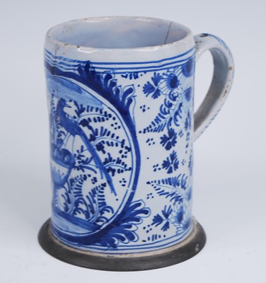 Lot 2081 - An English blue and white delftware tankard,...