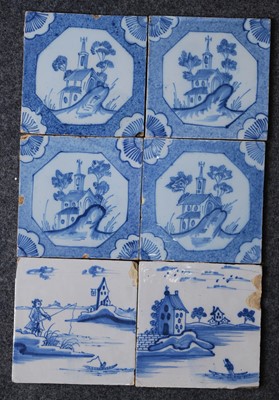 Lot 2122 - A set of four English blue and white delftware...