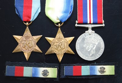 Lot 559 - A group of three WW II medals, to include 1939-...