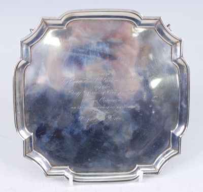 Lot 591 - A George V silver card waiter, of shaped...