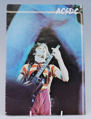 Lot 1130 - AC/DC, a concert programme from the "Dirty...