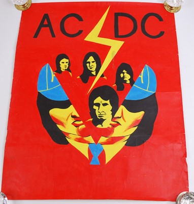 Lot 1131 - AC/DC, a hand painted poster, depicting the...