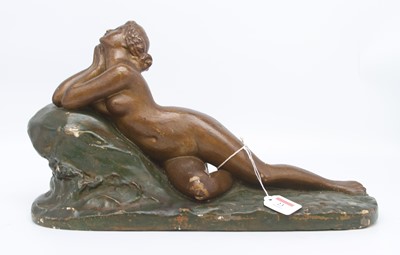 Lot 23 - An Art Deco style plaster figure of a...