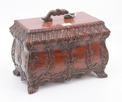 Lot 36 - A modern carved hardwood casket, with fitted...
