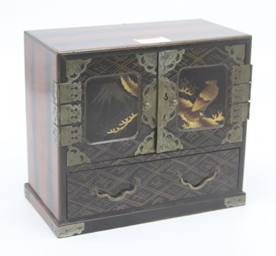 Lot 37 - An early 20th century Japanese lacquered table...
