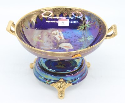 Lot 55 - A Carlton ware iridescent blue glazed table...